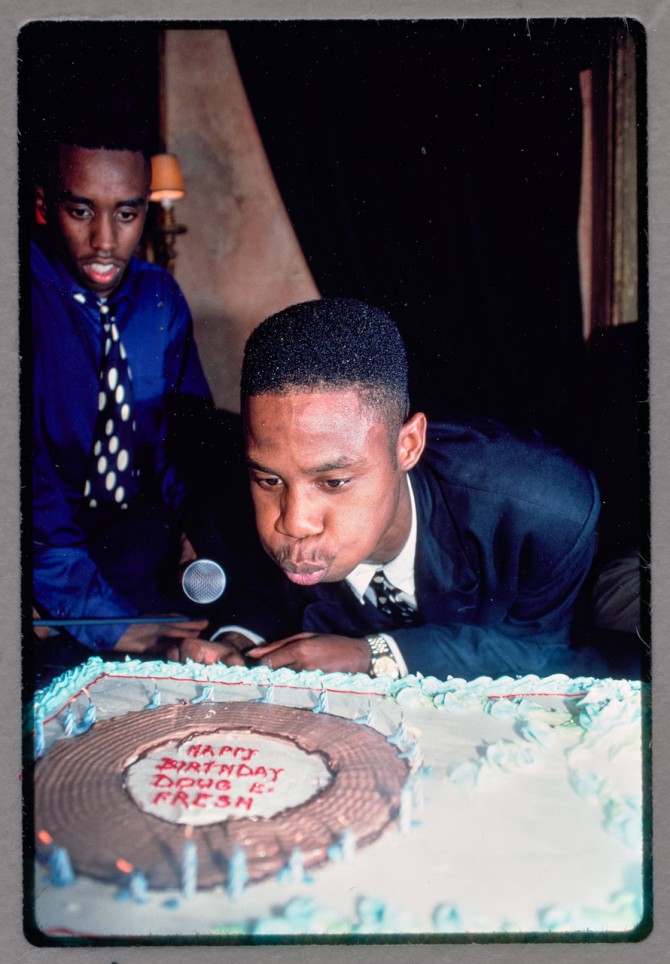 Doug E. Fresh blows out the candles on his birthday cake