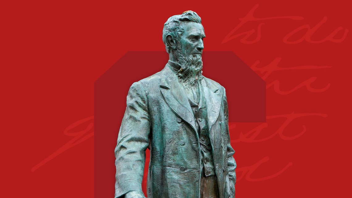 Ezra Cornell statue with red background