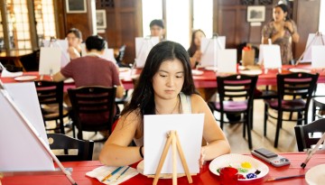 Students attend a paint and snack event in Willard Straight Hall as part of Senior Days activities.